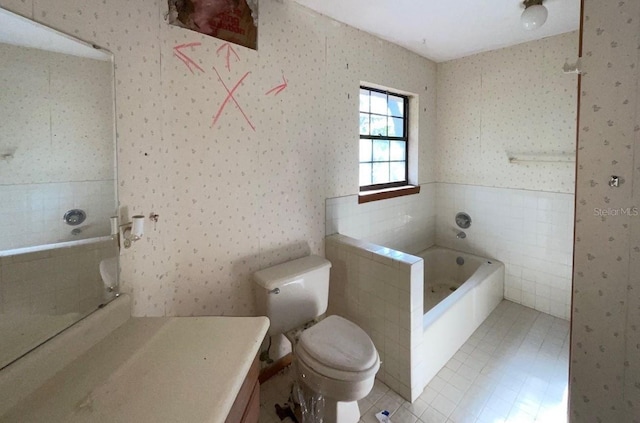 bathroom with a bath, tile walls, and toilet