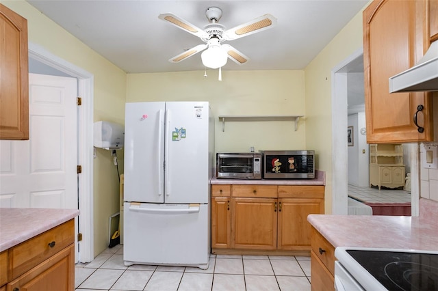 kitchen featuring ceiling fan, tasteful backsplash, ventilation hood, white appliances, and light tile patterned flooring