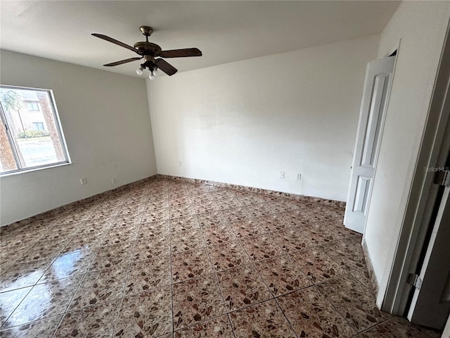 empty room featuring ceiling fan