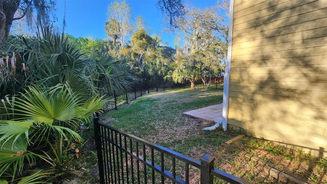 view of yard featuring fence