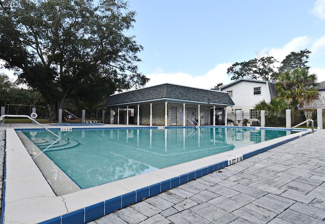 view of pool featuring a patio area