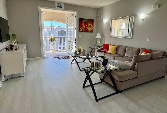 living room with light wood-type flooring