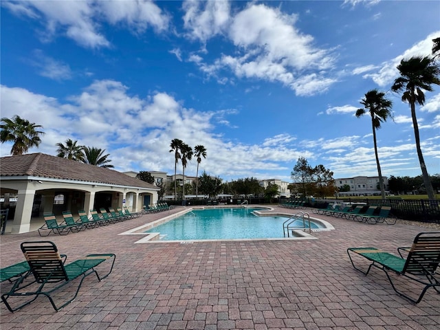 view of pool featuring a patio area