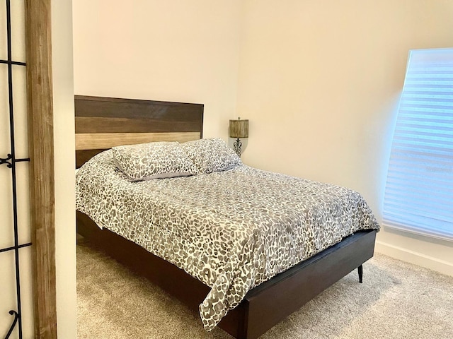 bedroom featuring carpet flooring