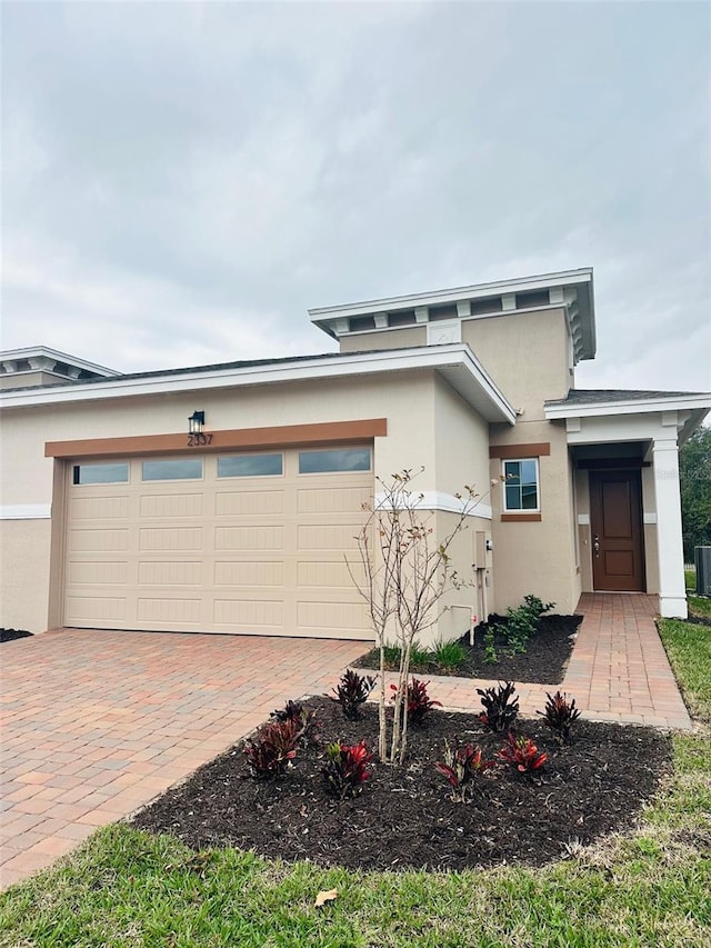 view of front of property with a garage