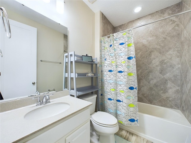 full bathroom featuring vanity, toilet, and shower / bathtub combination with curtain