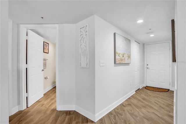 hallway featuring light hardwood / wood-style flooring