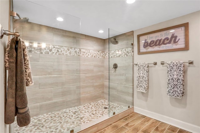 bathroom with tiled shower