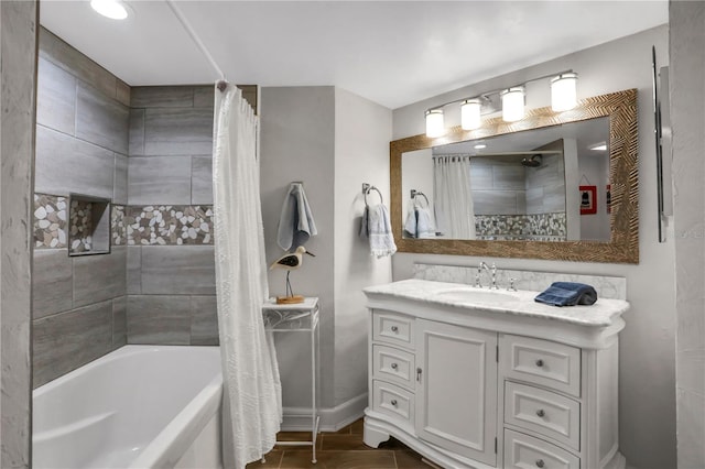 bathroom featuring shower / bath combination with curtain and vanity