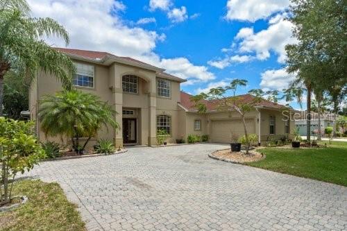 mediterranean / spanish-style house featuring a garage