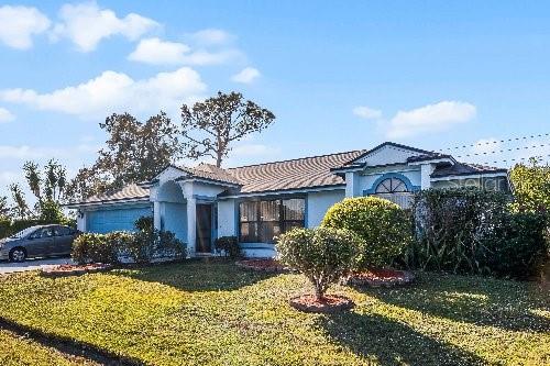 view of front of home with a front yard