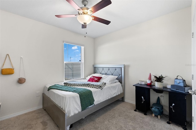 bedroom with light colored carpet and ceiling fan