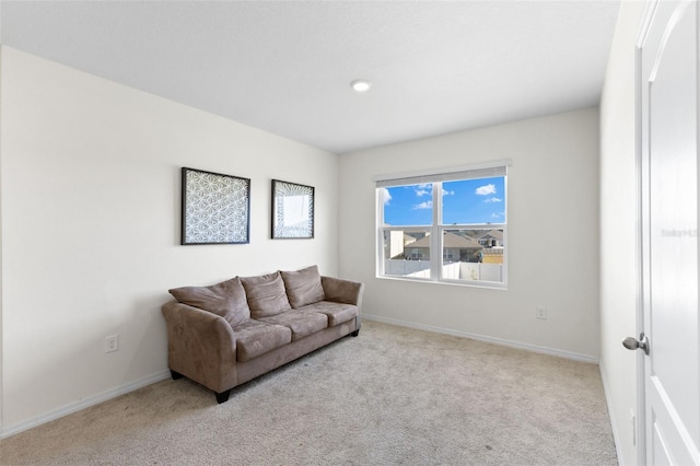 living room with light colored carpet