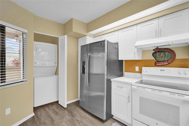 kitchen featuring white cabinetry, stacked washing maching and dryer, white electric range, stainless steel fridge with ice dispenser, and light hardwood / wood-style flooring