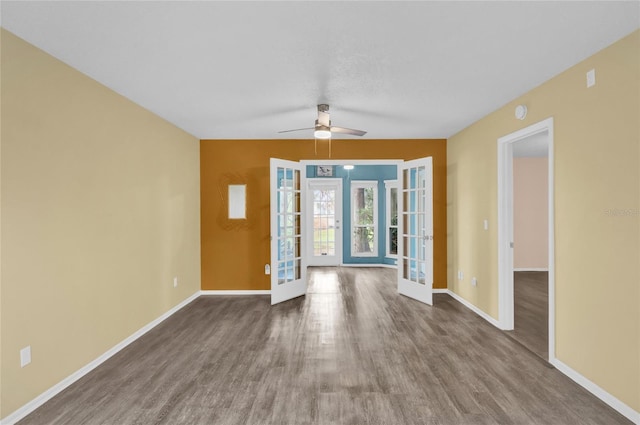 interior space with french doors, hardwood / wood-style flooring, and ceiling fan