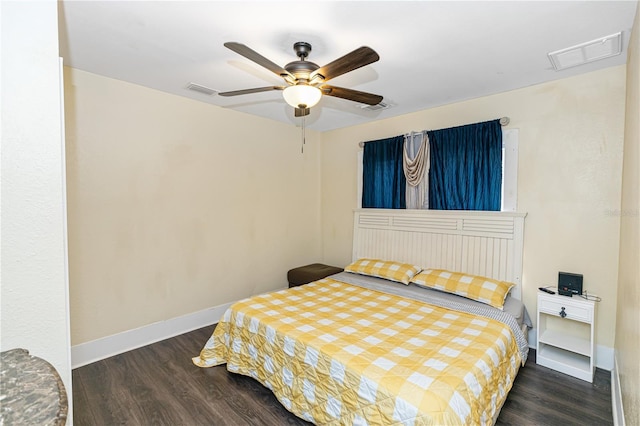 bedroom featuring dark hardwood / wood-style floors and ceiling fan