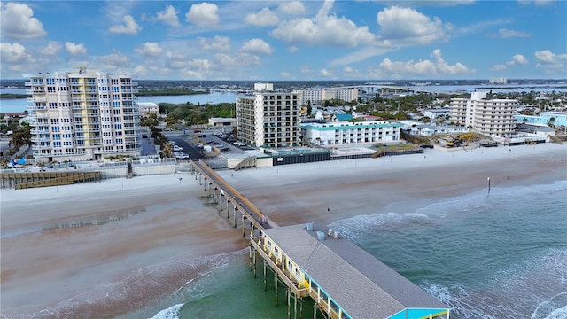 aerial view featuring a water view and a beach view