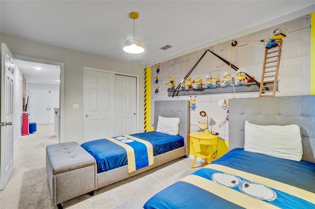 carpeted bedroom featuring a closet