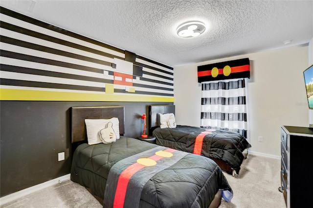 carpeted bedroom with a textured ceiling