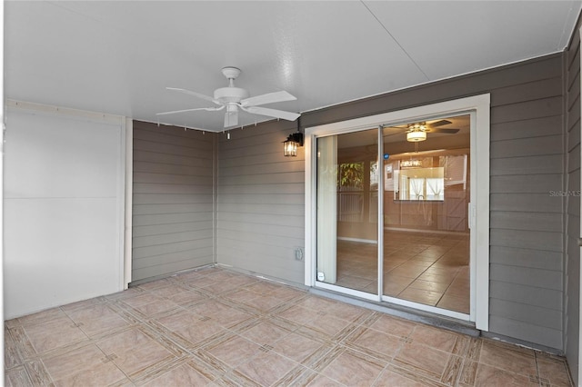 view of patio / terrace featuring ceiling fan