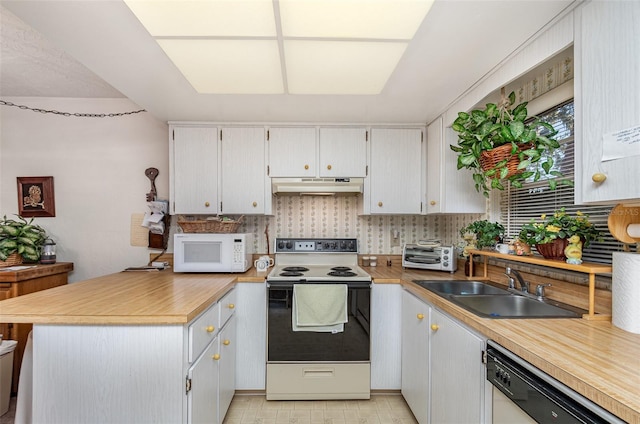 kitchen featuring white cabinetry, white appliances, and sink