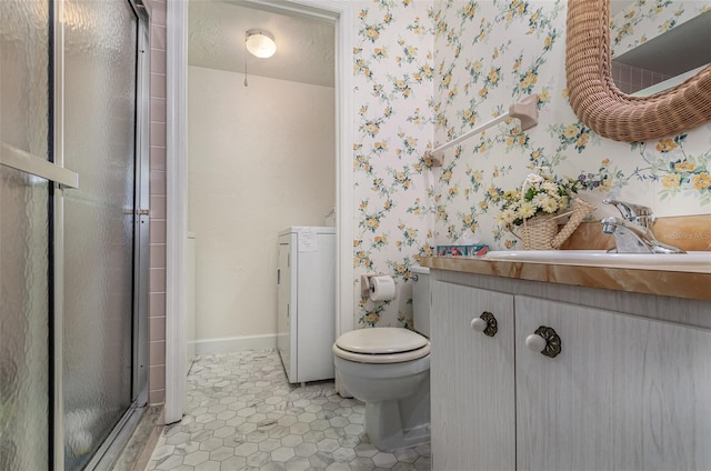 bathroom with a textured ceiling, vanity, toilet, and an enclosed shower