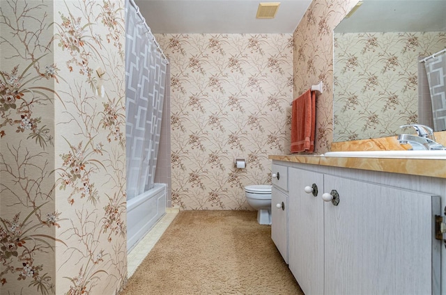 full bathroom featuring shower / bath combo, vanity, and toilet