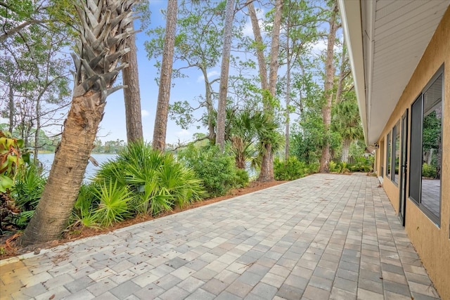 view of patio / terrace with a water view