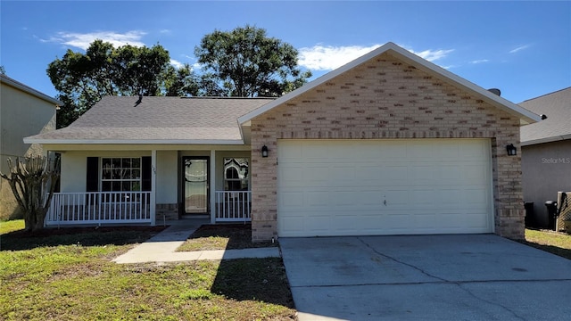 view of front of property featuring a garage and covered porch