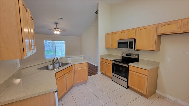 kitchen with ceiling fan, sink, light brown cabinets, and appliances with stainless steel finishes