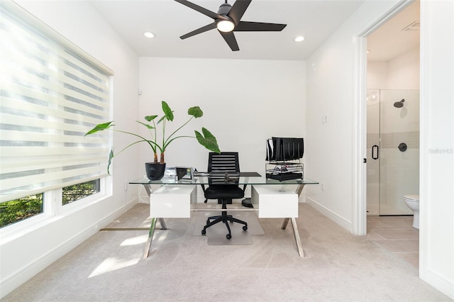 office area featuring ceiling fan and light colored carpet