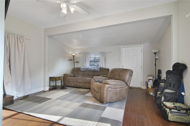 living room featuring ceiling fan and wood-type flooring