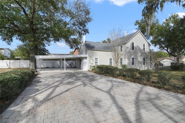 view of front of house featuring a carport