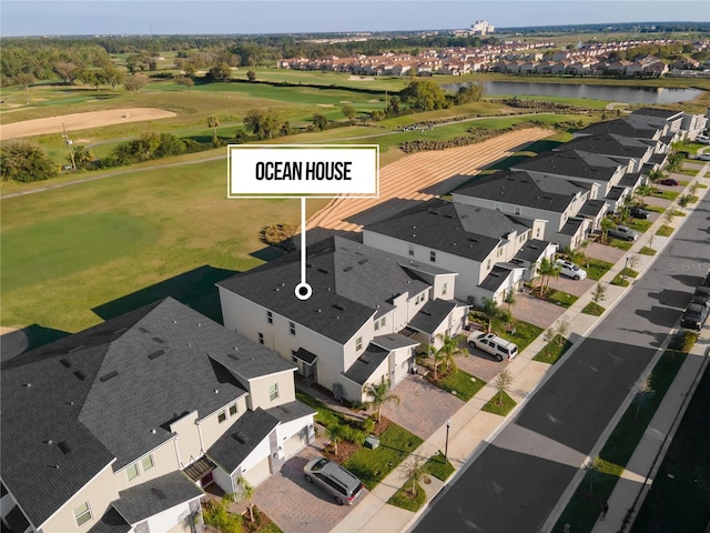 781 Ocean Course Ave Unit 601, Davenport, FL 33896 - aerial view of property and surrounding area featuring a golf club, a large body of water, and nearby suburban area
