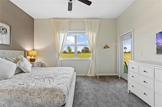 781 Ocean Course Ave Unit 601, Davenport, FL 33896 - bedroom featuring multiple windows, carpet floors, and a ceiling fan