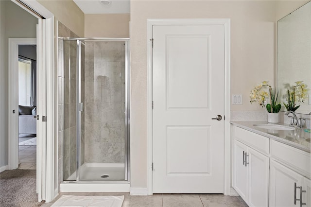 781 Ocean Course Ave Unit 601, Davenport, FL 33896 - bathroom with vanity, a shower stall, and tile patterned flooring