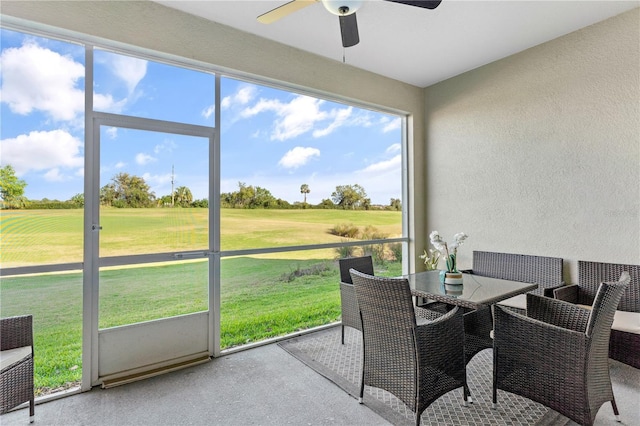 781 Ocean Course Ave Unit 601, Davenport, FL 33896 - sunroom / solarium with golf course view, a ceiling fan, and healthy amount of natural light