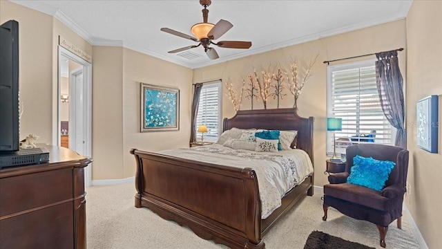 carpeted bedroom featuring ceiling fan, ornamental molding, and multiple windows