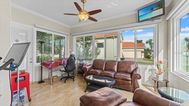 sunroom featuring ceiling fan and a healthy amount of sunlight