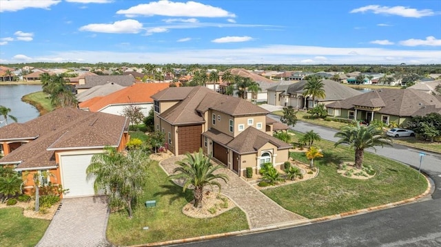 bird's eye view with a water view