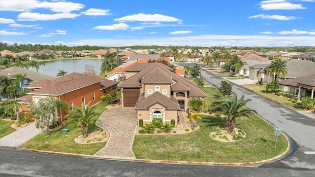 drone / aerial view with a water view