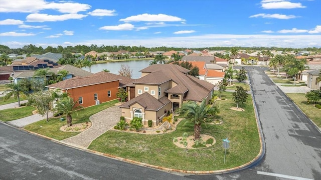 drone / aerial view with a water view