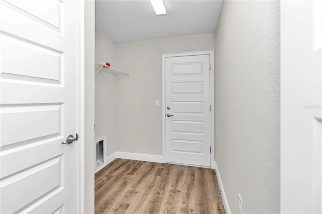 washroom featuring light hardwood / wood-style floors