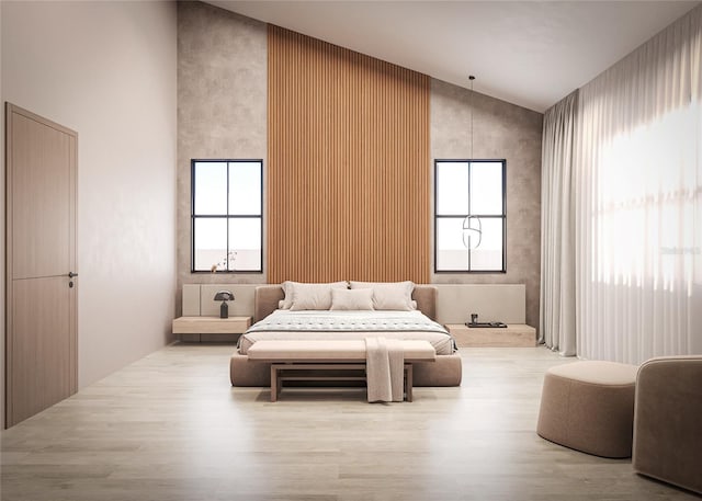 bedroom featuring light hardwood / wood-style flooring, high vaulted ceiling, and multiple windows