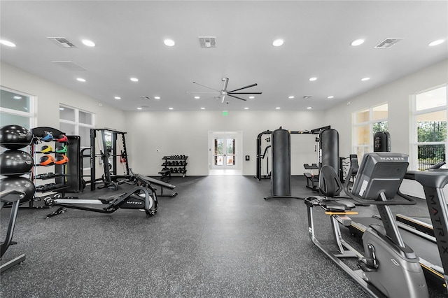 exercise room with ceiling fan