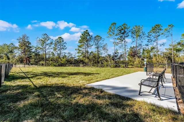 view of home's community with a patio area and a lawn