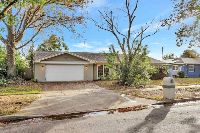 single story home featuring a garage