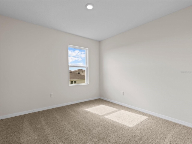 view of carpeted spare room