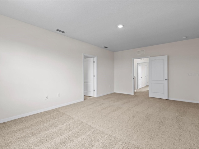 empty room with light carpet