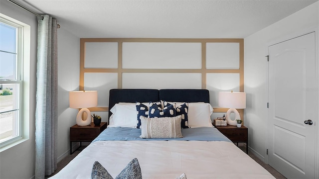 bedroom featuring a textured ceiling